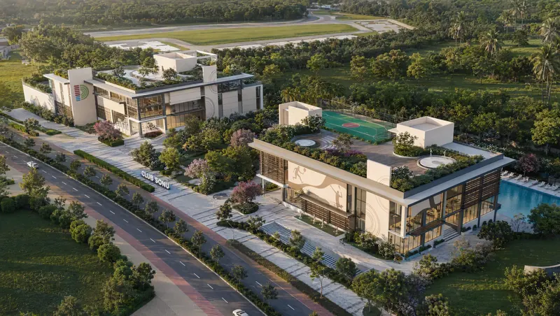 Aerial view of the clubhouse with rooftop courts and pool